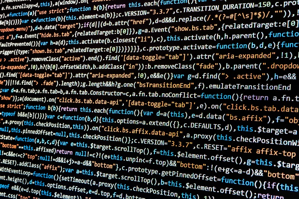 Cuplikan kode JavaScript di layar monitor